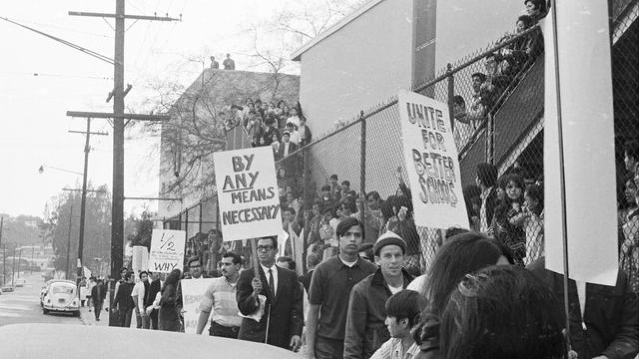 "Roosevelt High School protests," Students and community supporters picket Roosevelt High School as students who were locked in look on. Devra Weber/La Raza Photograph Collection
