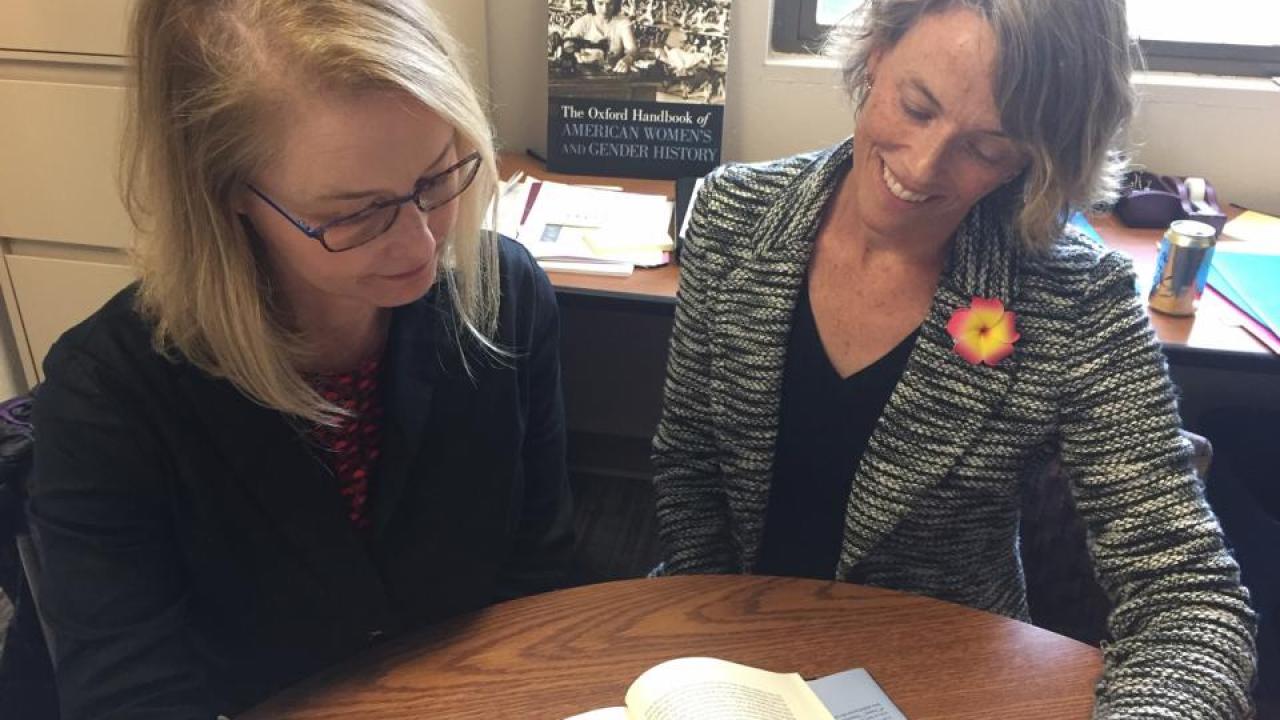 Lisa Materson and Ellen Hartigan-O'Connor, associate professors of history, read from their new book. (Photo/Karen Nikos-Rose) Lisa Materson and Ellen Hartigan-O'Connor, associate professors of history, read from their new book. (Photo/Karen Nikos-Rose)