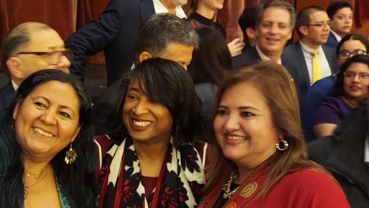 Vice Chancellor Renetta Tull stands with members LAACEI for a casual group photo.