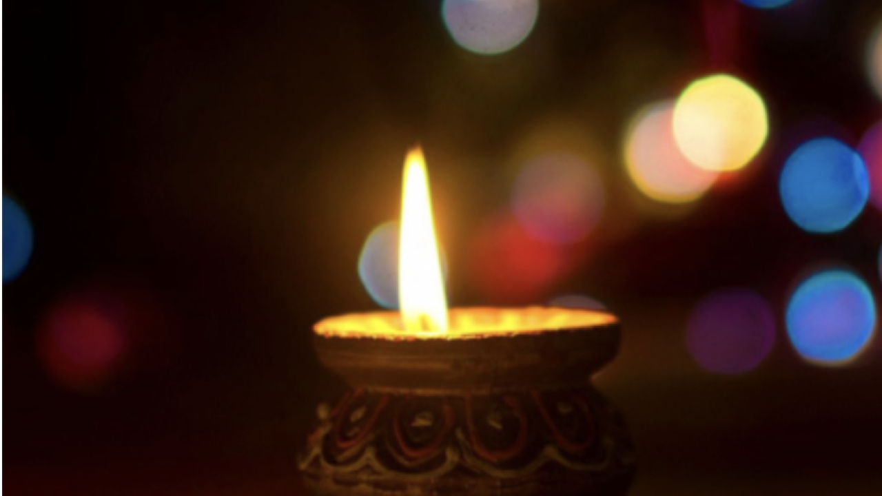 A photo of a candle burning.