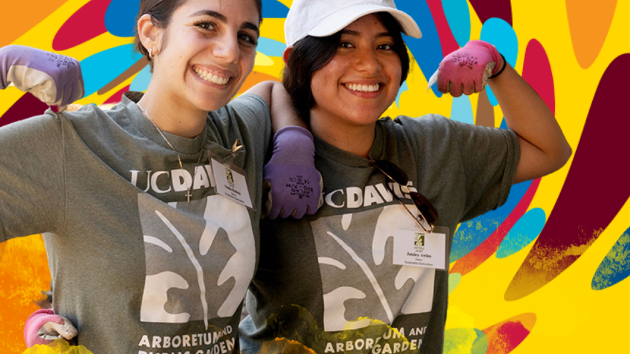 Two smiling individuals wearing "UC DAVIS ARBORETUM AND PUBLIC GARDEN" t-shirts and purple gloves against a colorful abstract background.