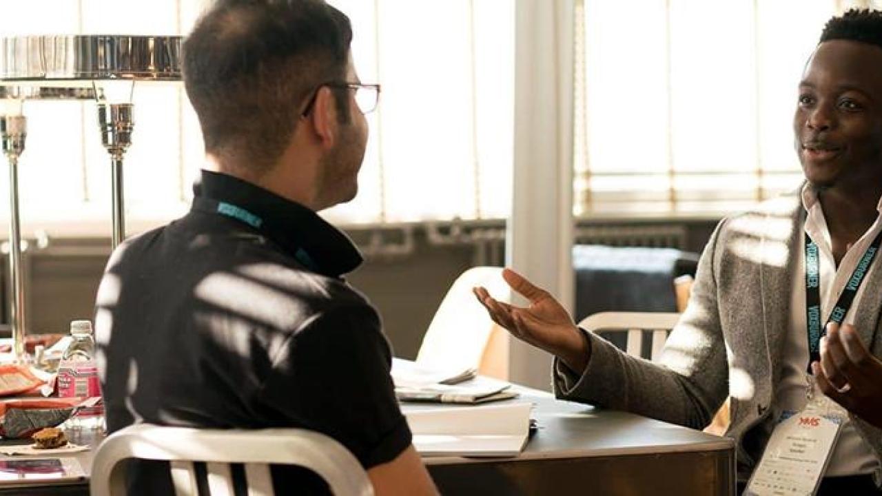 photo-of-men-having-conversation-935949.jpg
