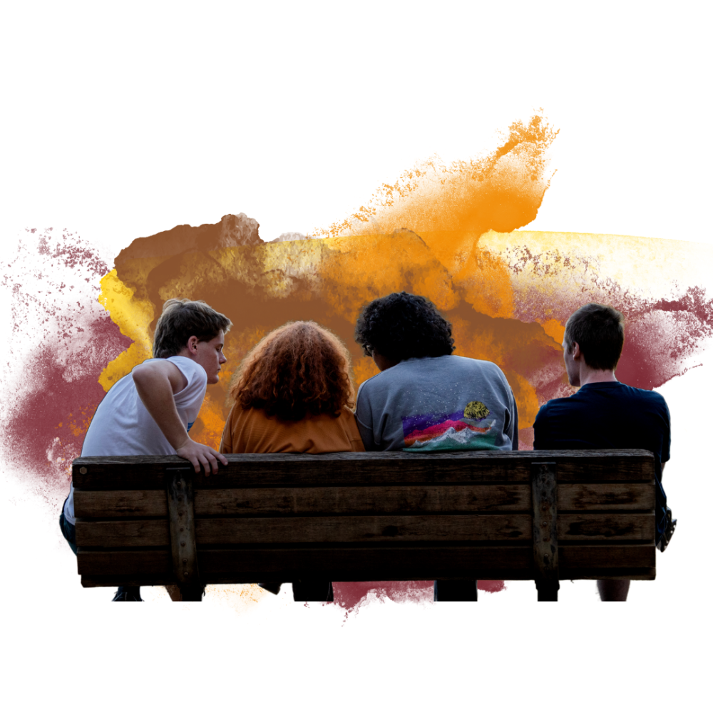 Four people sitting on a bench with colorful paint splashes in the background.