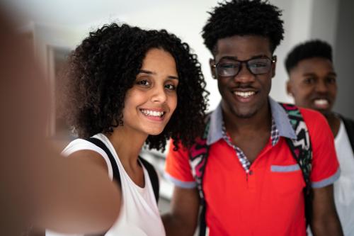 Two African American students smiling