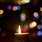 A photo of a candle burning.