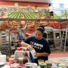 Edith Munguia, a landscape architecture major during the painting of the mural in the Yolo County Juvenile Detention Facility in Woodside, CA