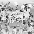 Protesters marching on Whittier Boulevard hold a banner that reads "Chicano Law Students Association" during the National Chicano Moratorium.