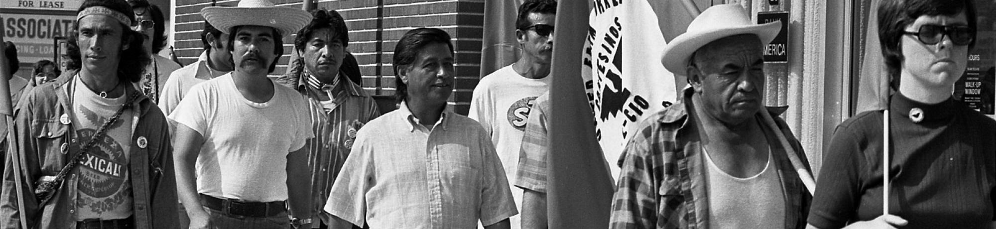 Cesar Chavez (center) on march from Mexican border to Sacramento with United Farm Workers members in Redondo Beach, California.